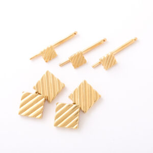 Paul Flato 14kt Gold Ribbed Square Cufflinks & Studs